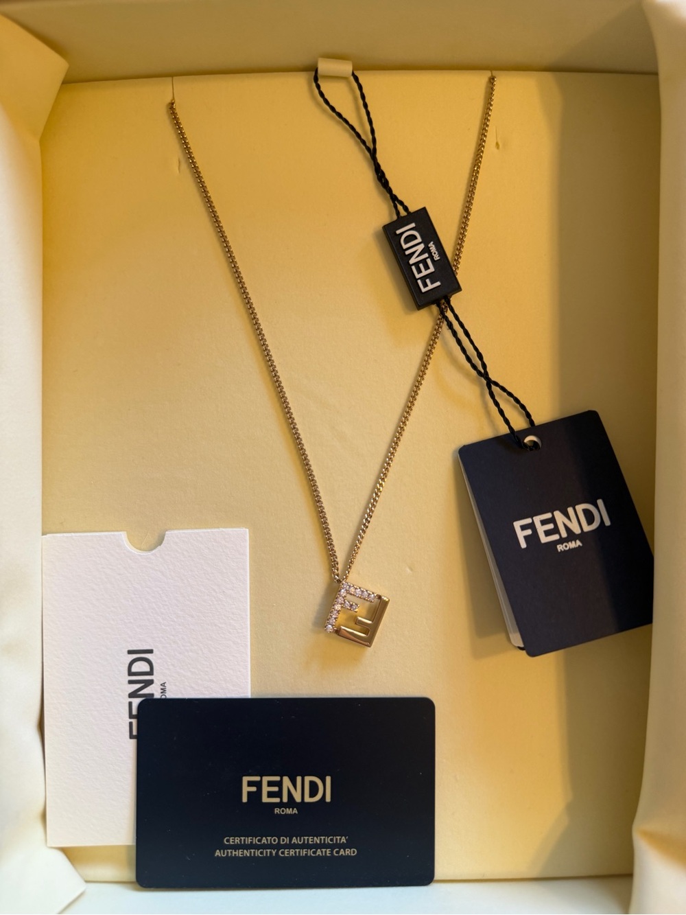 Fendi Gold Logo Pendant Necklace with Clear Stones